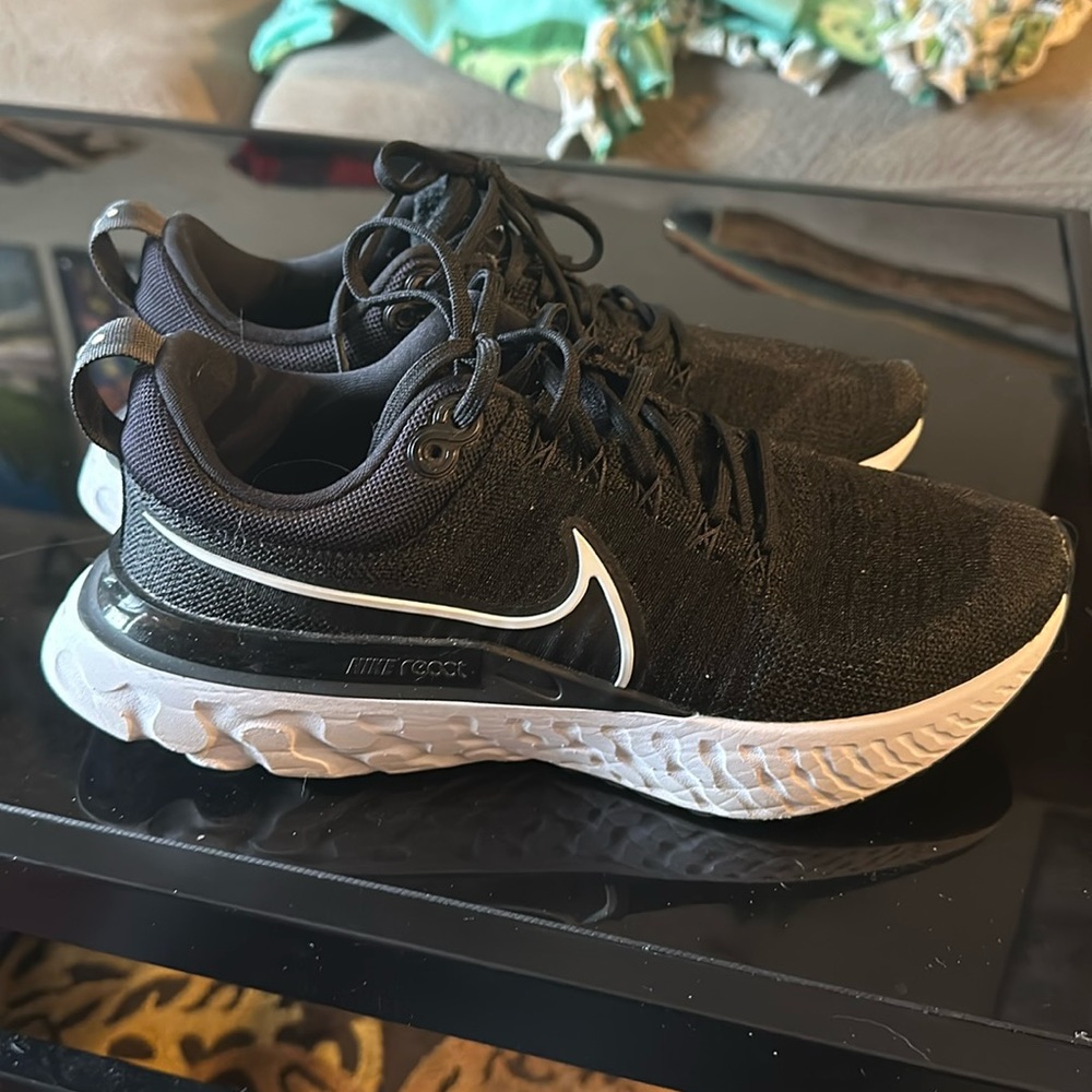 Black Nike React Infinity Flyknit shoes